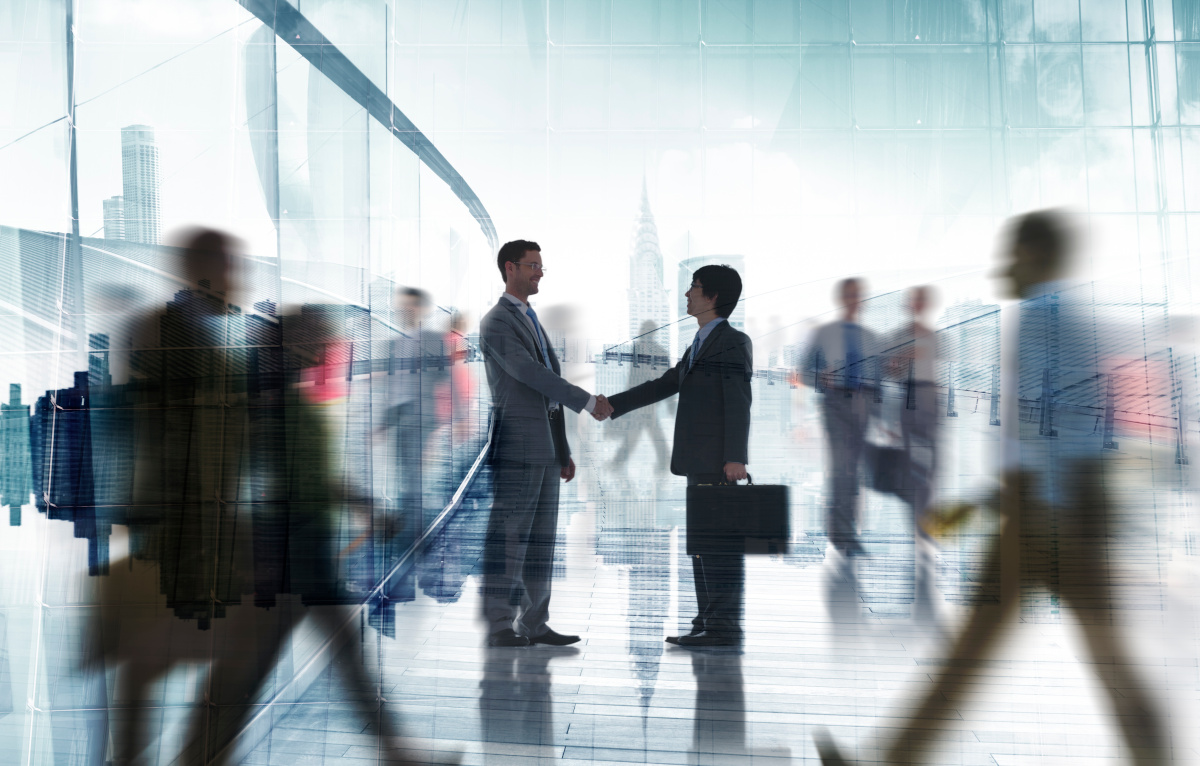 Two businessman shaking hands