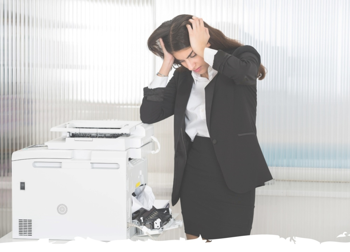 Frustrated business woman with printer