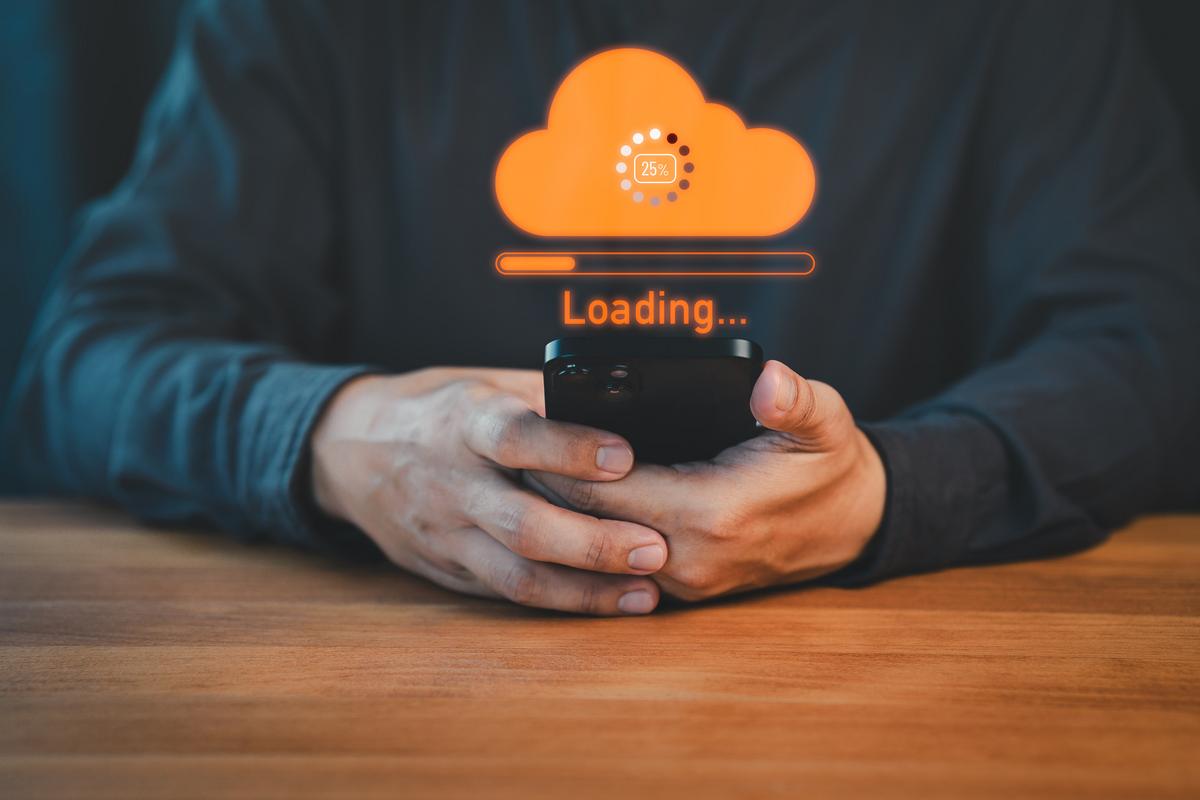 Man uploading data onto the cloud