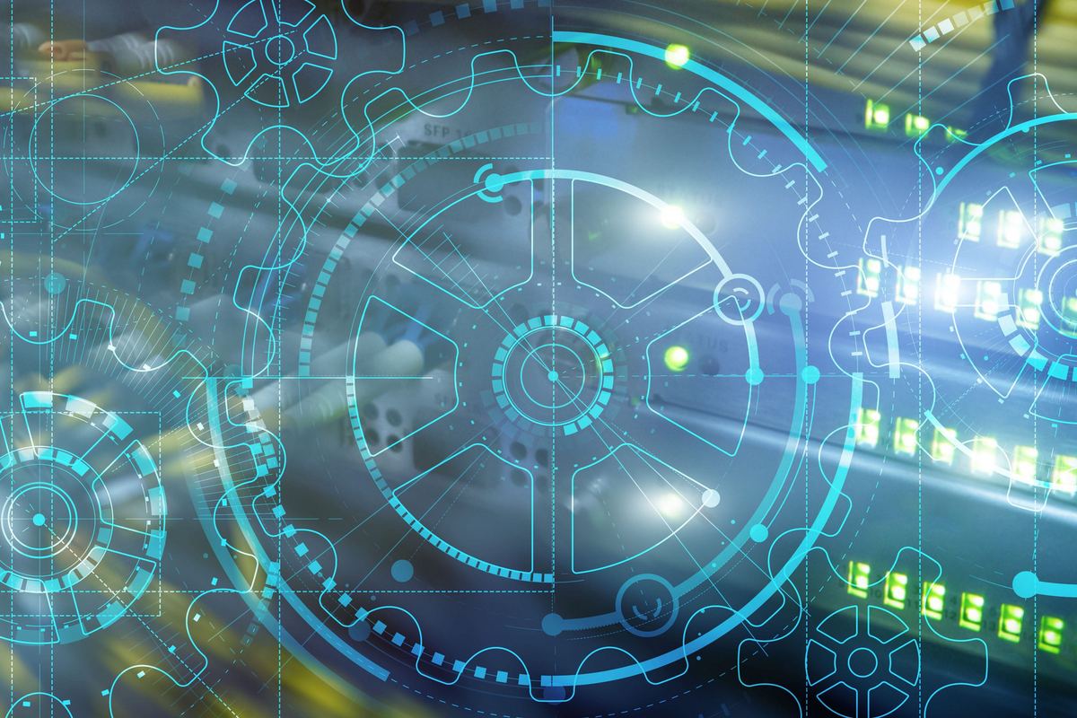 Mechanical gears interlocked with circuit board technology representing healthcare IT infrastructure