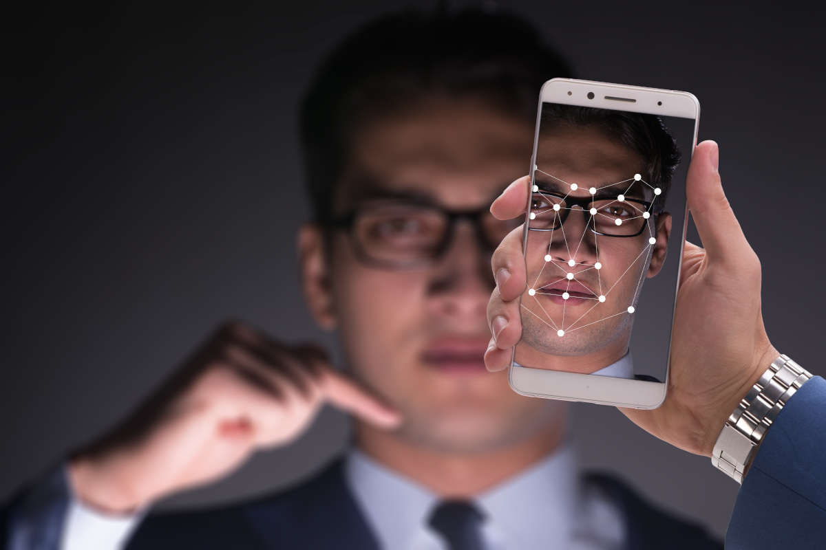 A phone screen showing facial recognition