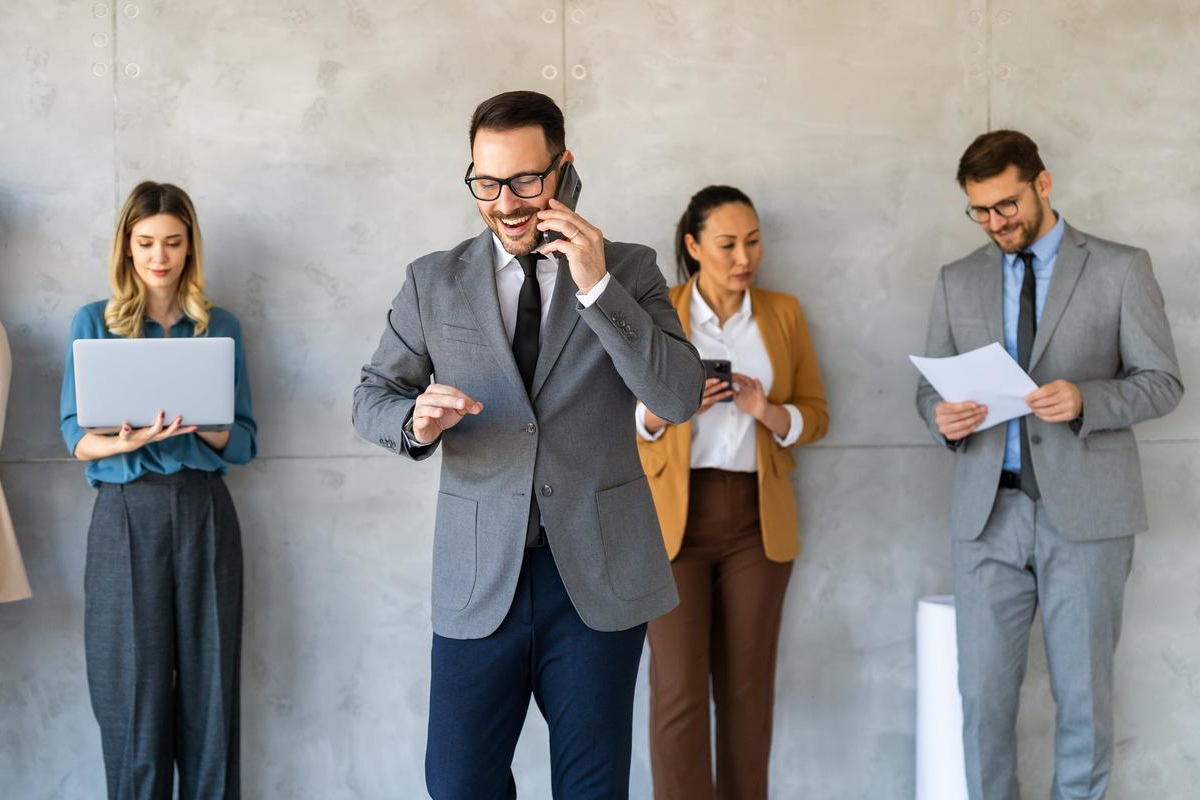 Business people talking on phone.