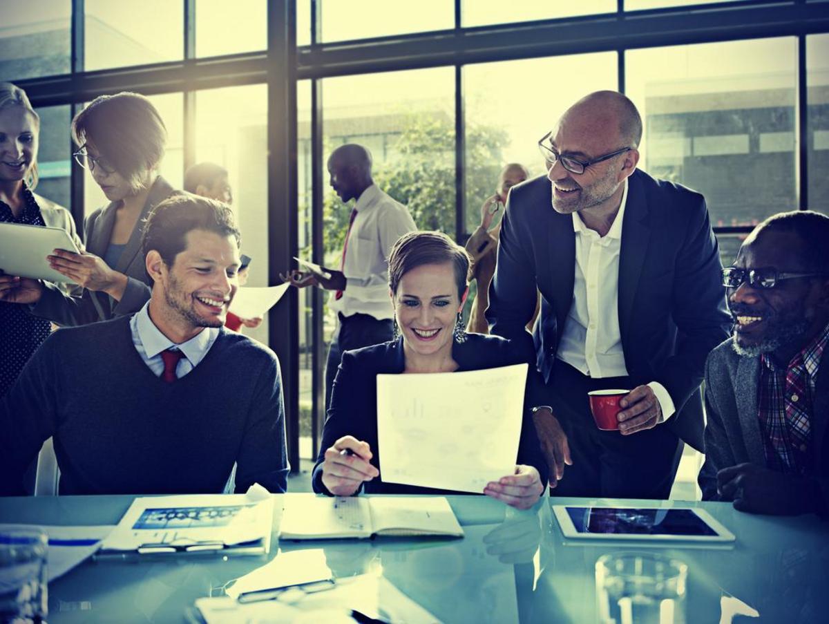 Smiling business people working in an office
