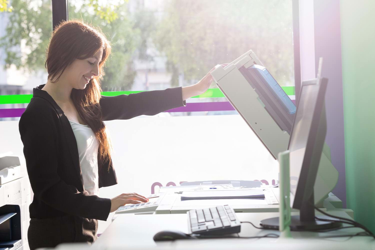 Woman using printer