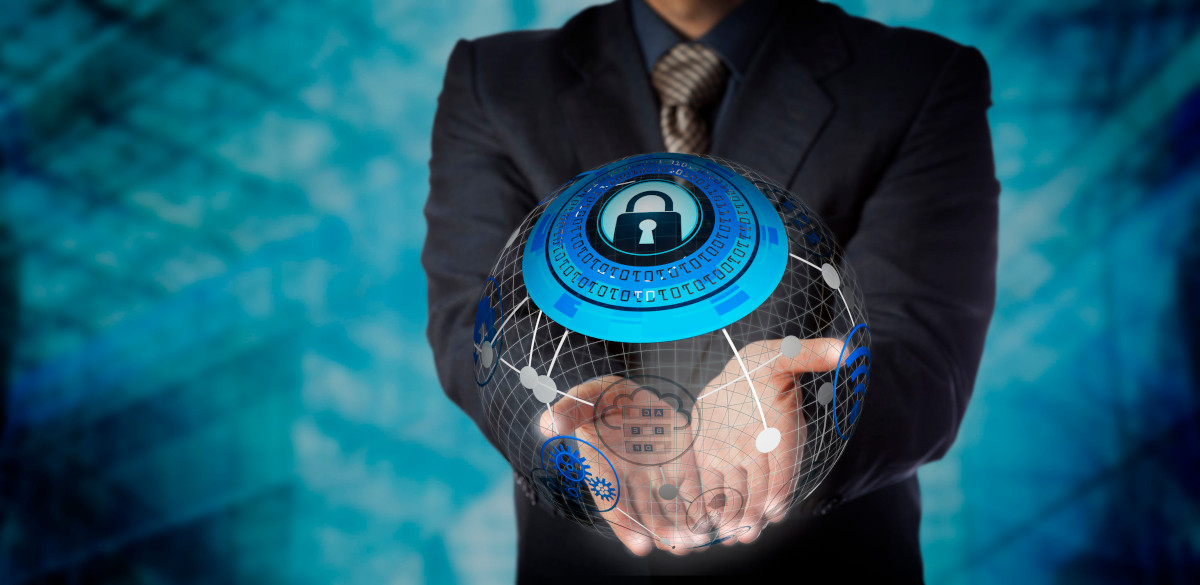 Man holding digital globe with padlock on it